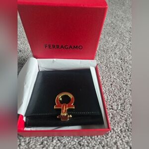 Ferragamo Black Wallet with Gold Accent
